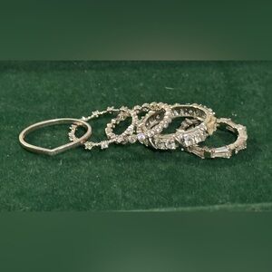 Set of five silver and CZ band style rings